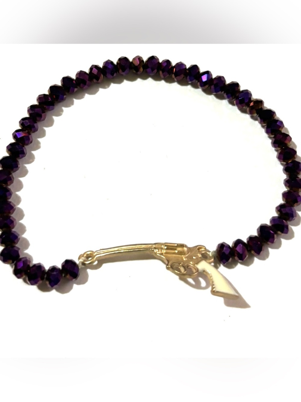 Purple Crystal Beaded Bracelet with Gold Gun Charm